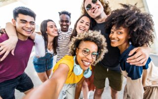 Group of young people smiling being part of future leaders