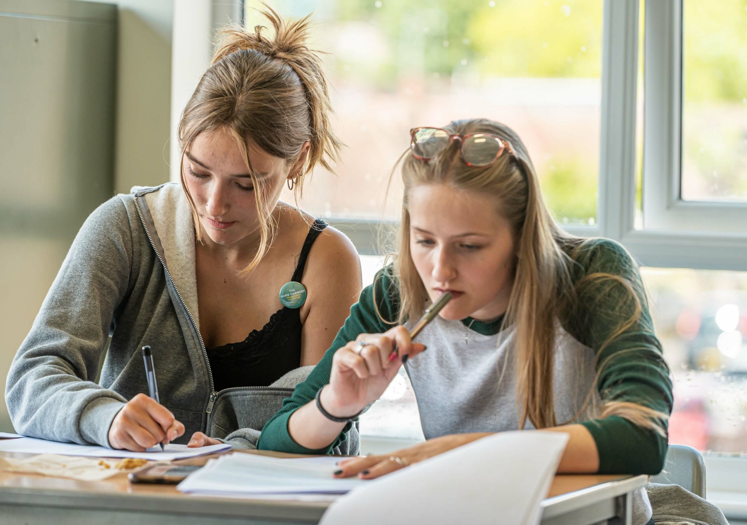 Two young women taking part in the Young People Index assessments